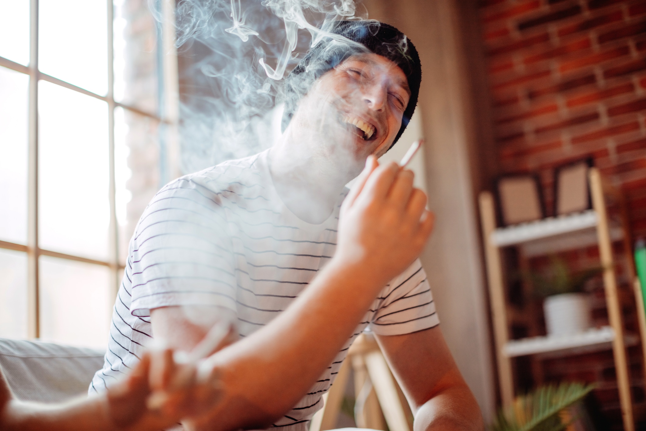 Enjoying marijuana in living room