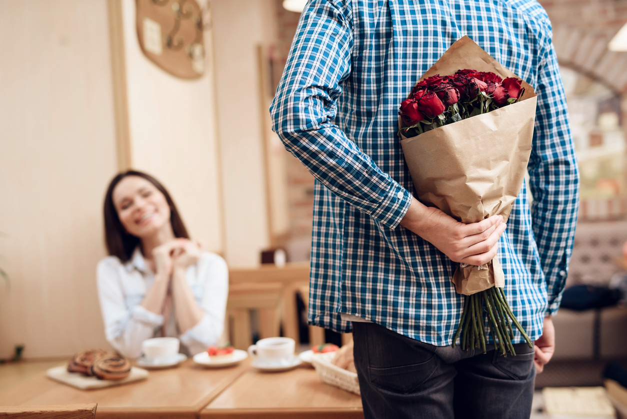 Happy Young Couple Have Date in Modern Cafeteria.