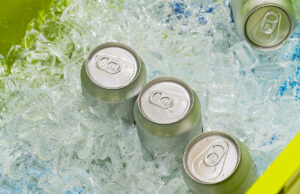 Metal canned drink in ice cubes